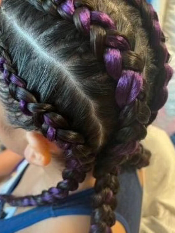 Val braided purple hair into braids